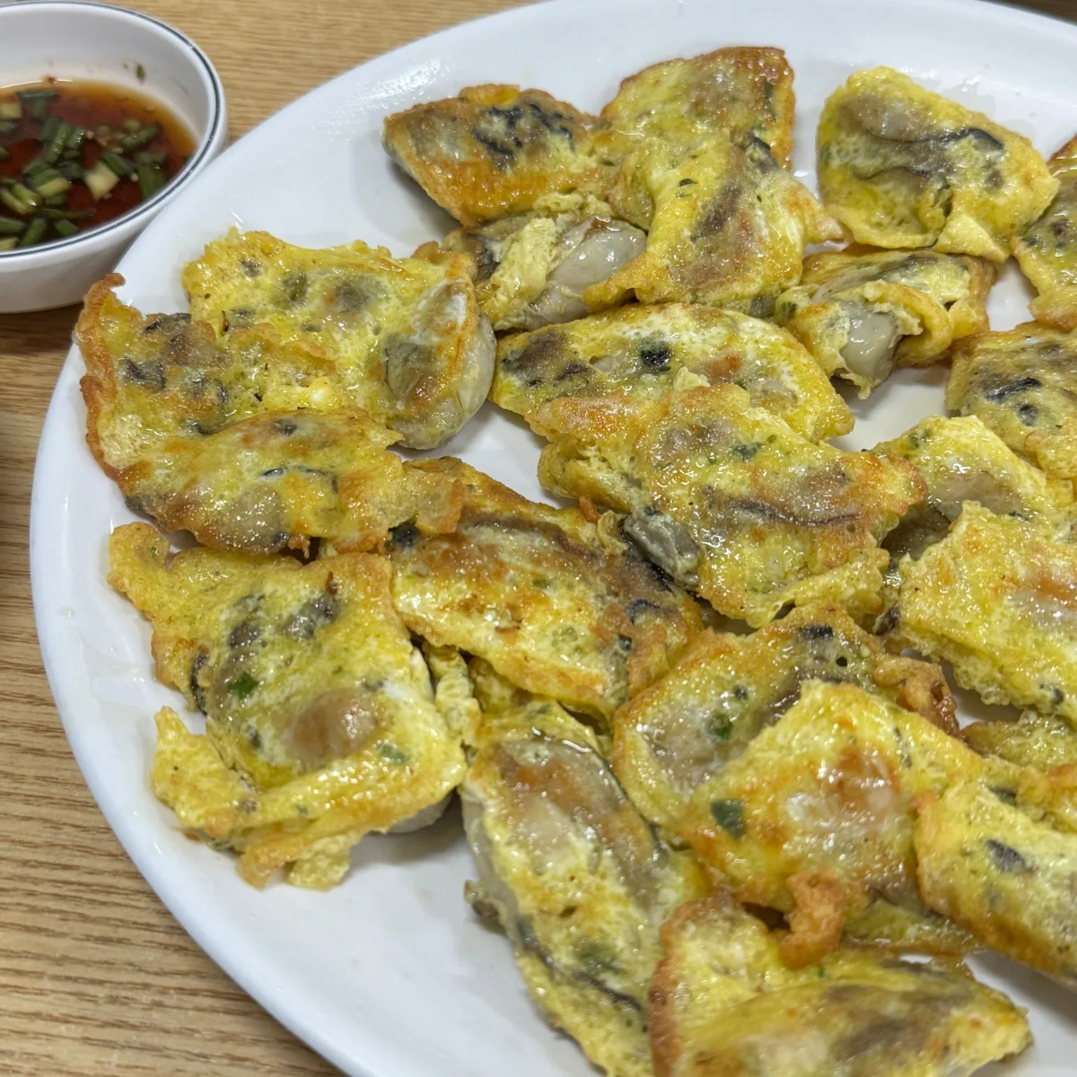 南海牡蠣クッパ — 卵衣で焼いた牡蠣のチヂミ